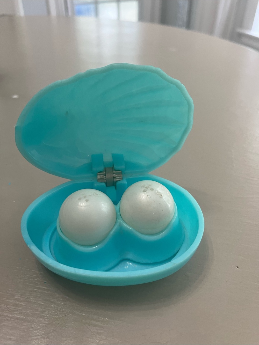 Turquoise Shell Plastic salt and pepper shakers.